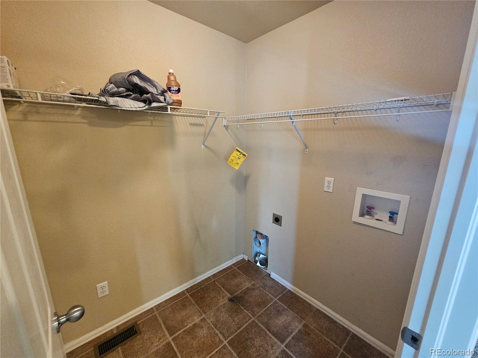 5352 Canadian Rose View Colorado Springs, CO 80916 - Photo 8 of 16 a view of walk in closet with empty racks