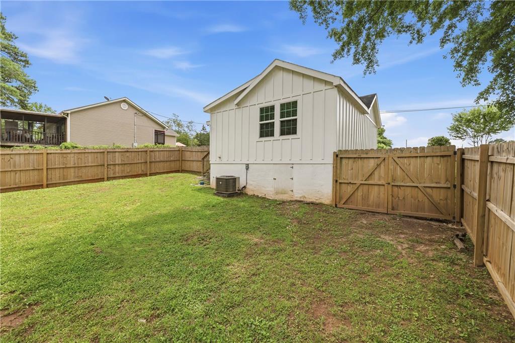 156 Pine Avenue Commerce, GA 30529 - Photo 25 of 35 a view of a backyard of the house