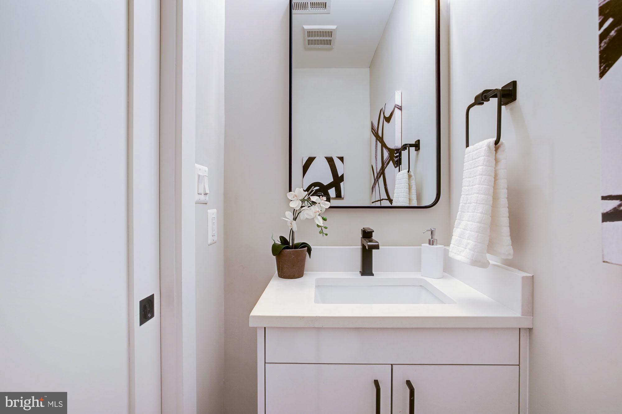 2301 Ontario Road Northwest, Unit 301 Washington, DC 20009 - Photo 5 of 17 1/2 bath for guests - photo of similar unit