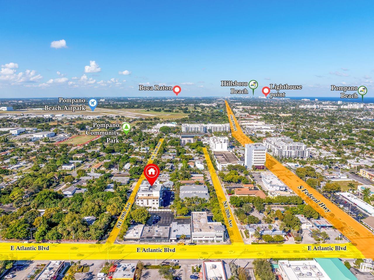 20 Northeast 19th Avenue, Unit 101 Pompano Beach, FL 33060 - Photo 11 of 17 a view of swimming pool with a yard and outdoor seating