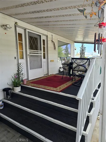 a outdoor space with lots of furniture and plants