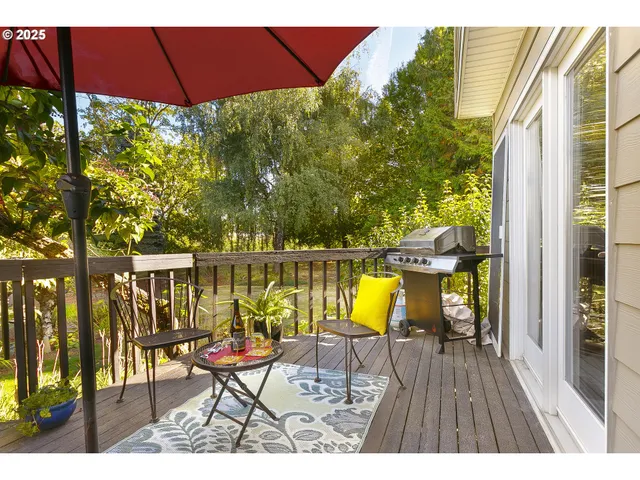 a view of sitting area with furniture and backyard