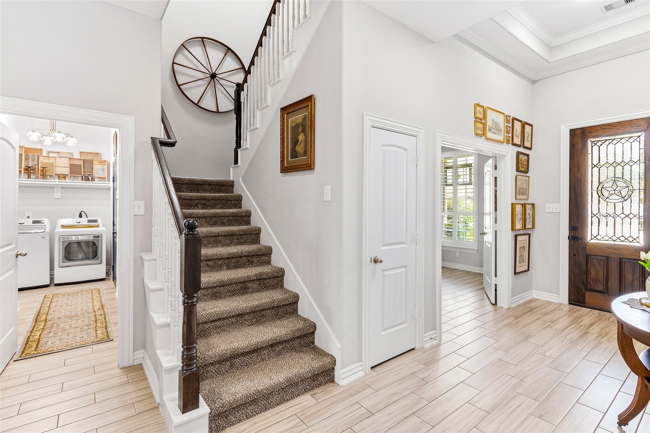 208 Woodside Court Clute, TX 77531 - Photo 17 of 38 a view of a livingroom with wooden floor and stairs