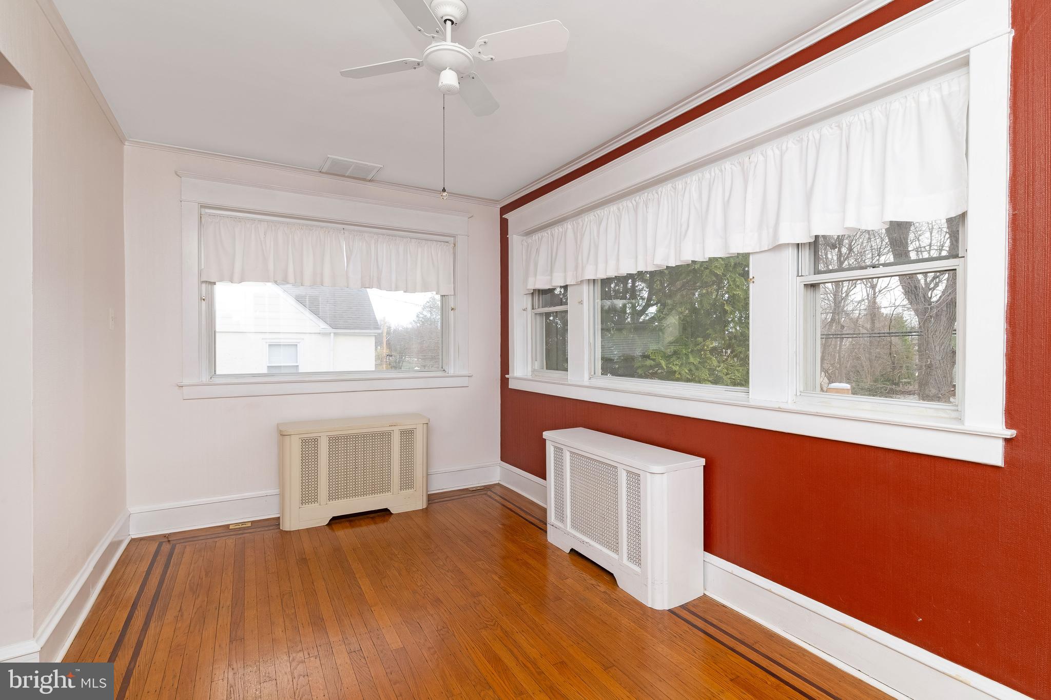 150 Hart Lane Springfield, PA 19064 - Photo 11 of 49 a view of room with window and wooden floor