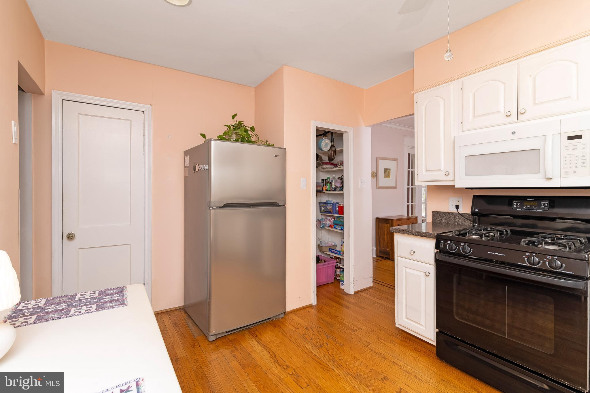 150 Hart Lane Springfield, PA 19064 - Photo 21 of 49 a kitchen with stainless steel appliances a refrigerator a stove and a cabinets