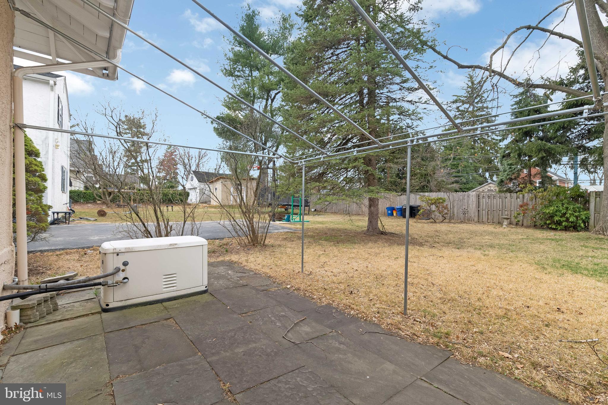 150 Hart Lane Springfield, PA 19064 - Photo 38 of 49 a view of a patio with a table and chairs