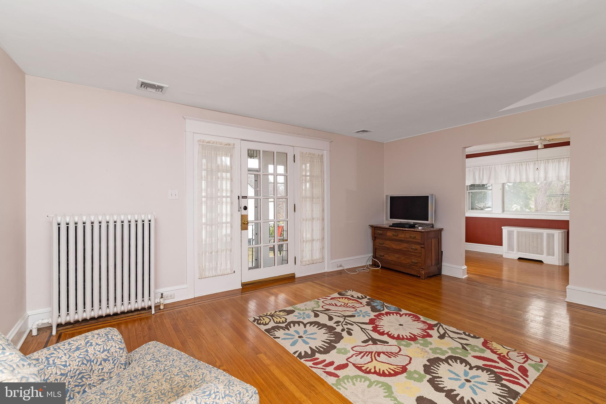150 Hart Lane Springfield, PA 19064 - Photo 8 of 49 a living room with furniture rug and wooden floor