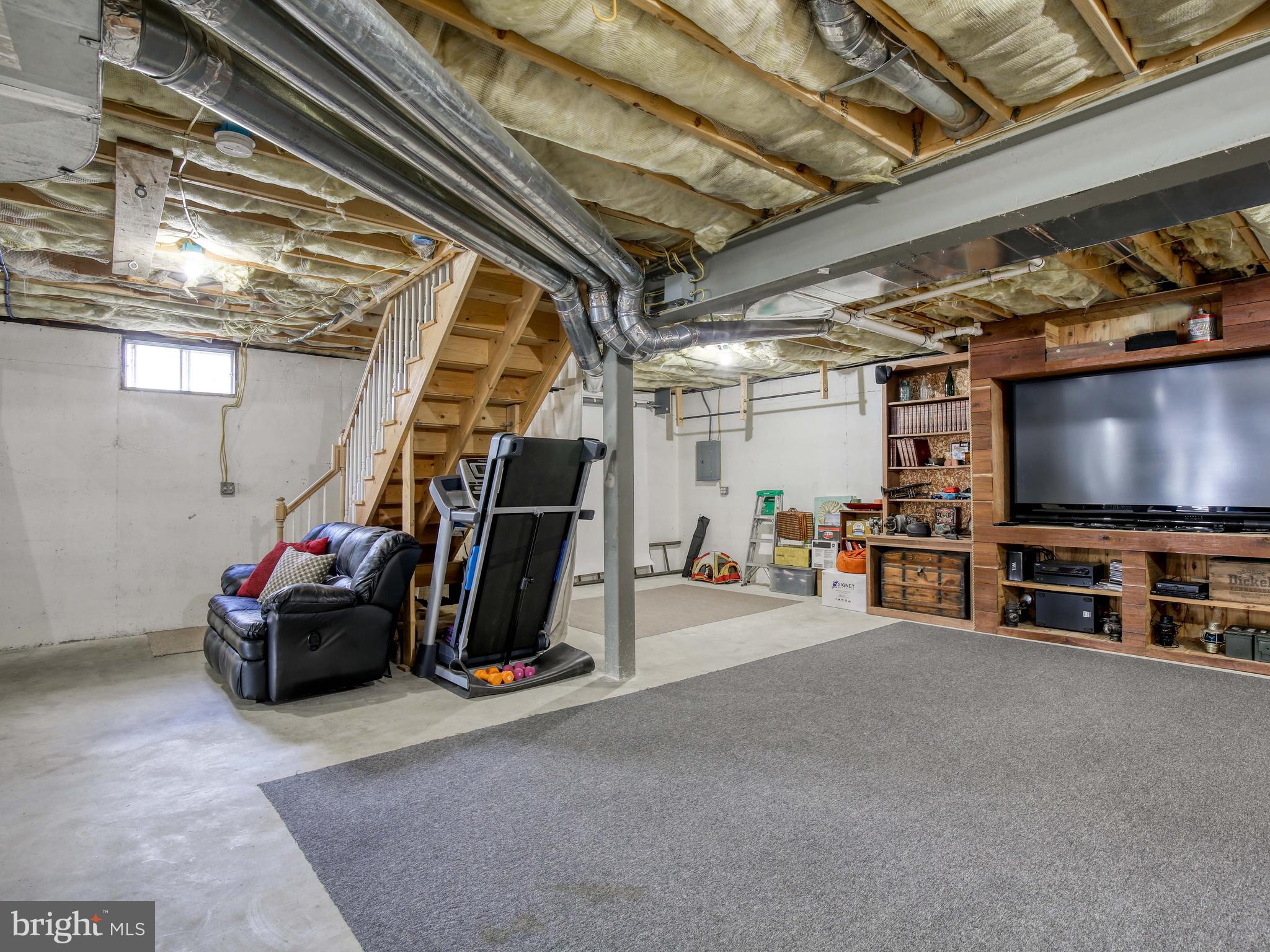 686 Cedar Grove Road Winchester, VA 22603 - Photo 39 of 72 Lower level party bonanza! TV, Games, Wet Bar!