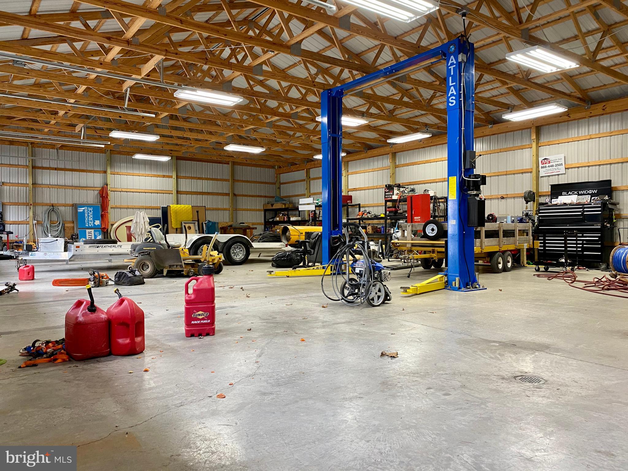 686 Cedar Grove Road Winchester, VA 22603 - Photo 56 of 72 Two post automotive lift conveys!