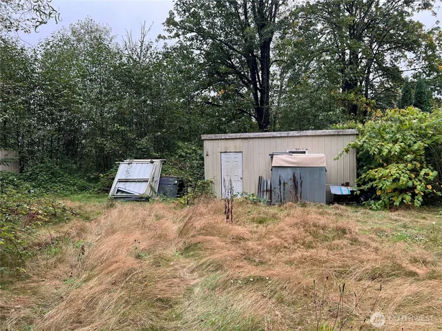 a view of a garden with a bench