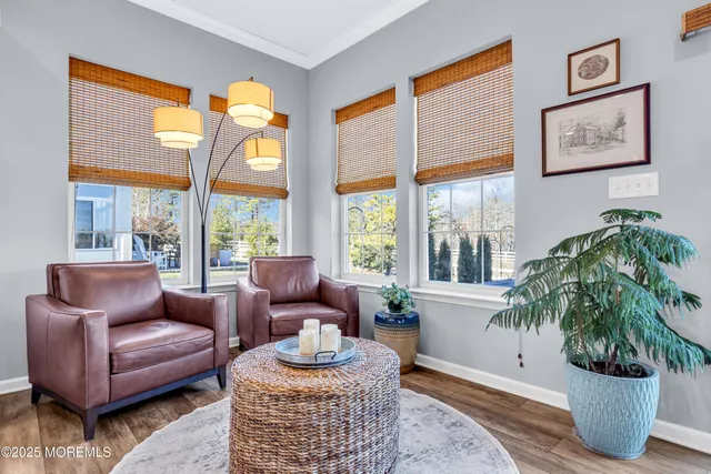 a kitchen with stainless steel appliances granite countertop a sink a stove a microwave and cabinets