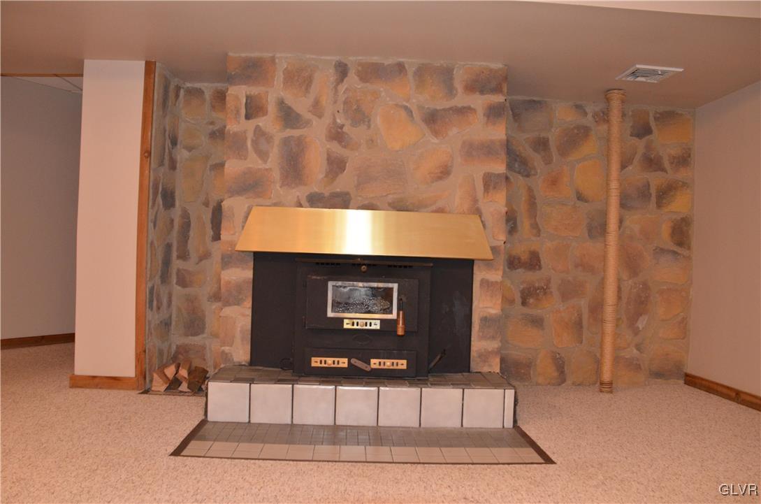 1388 Santee Mill Road Bethlehem, PA 18017 - Photo 37 of 40 Wood-burning fireplace in basement.
