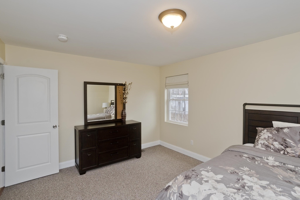 48 Mountain Avenue West Springfield, MA 01089 - Photo 23 of 39 a bedroom with a bed and window