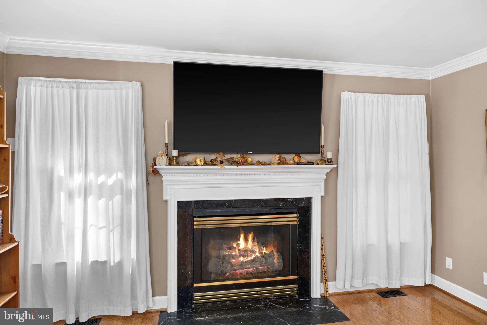 135 Old Cropps Mill Road Fredericksburg, VA 22406 - Photo 13 of 47 a living room with a fireplace