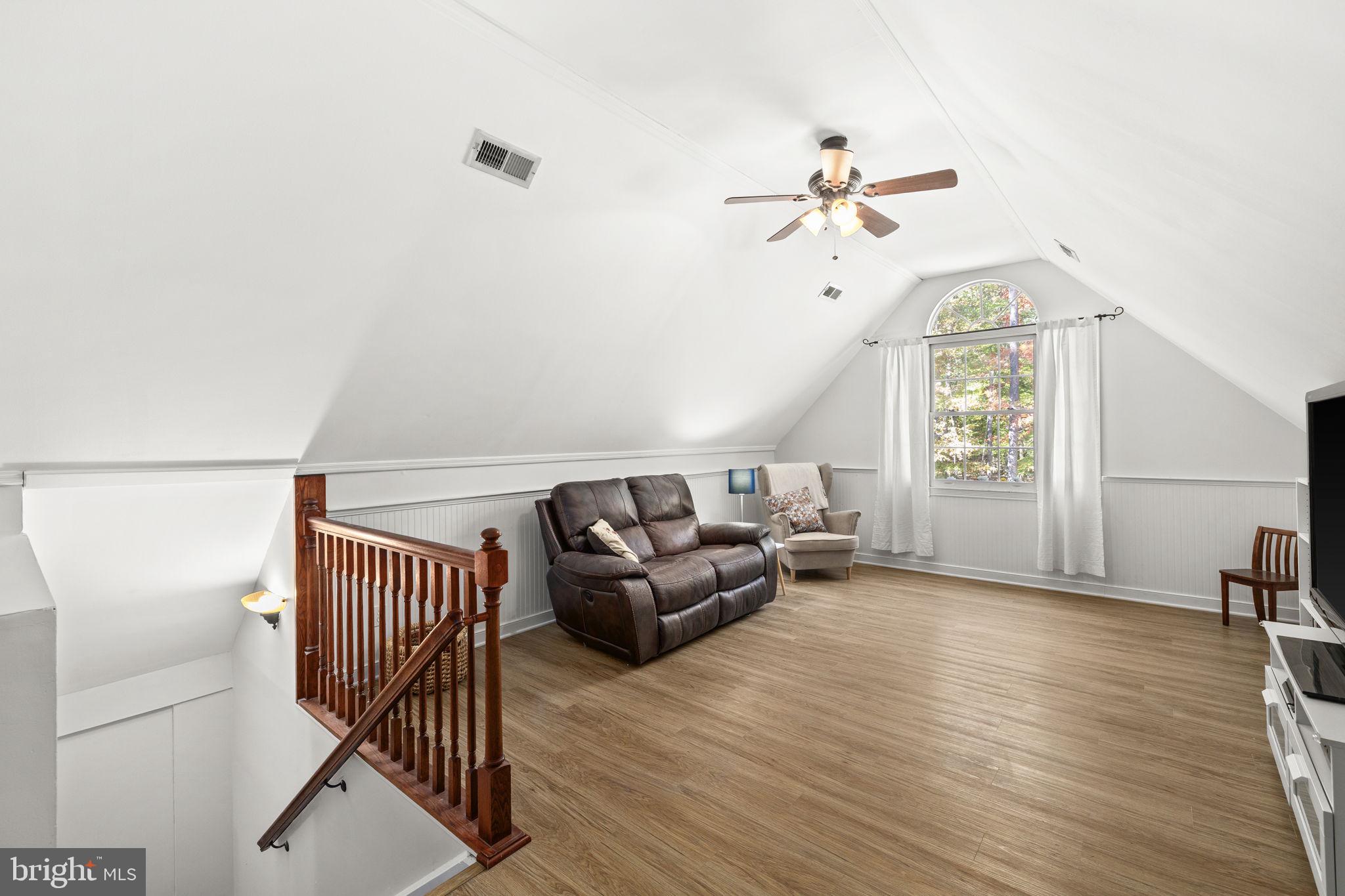 135 Old Cropps Mill Road Fredericksburg, VA 22406 - Photo 35 of 47 a living room with furniture and wooden floor