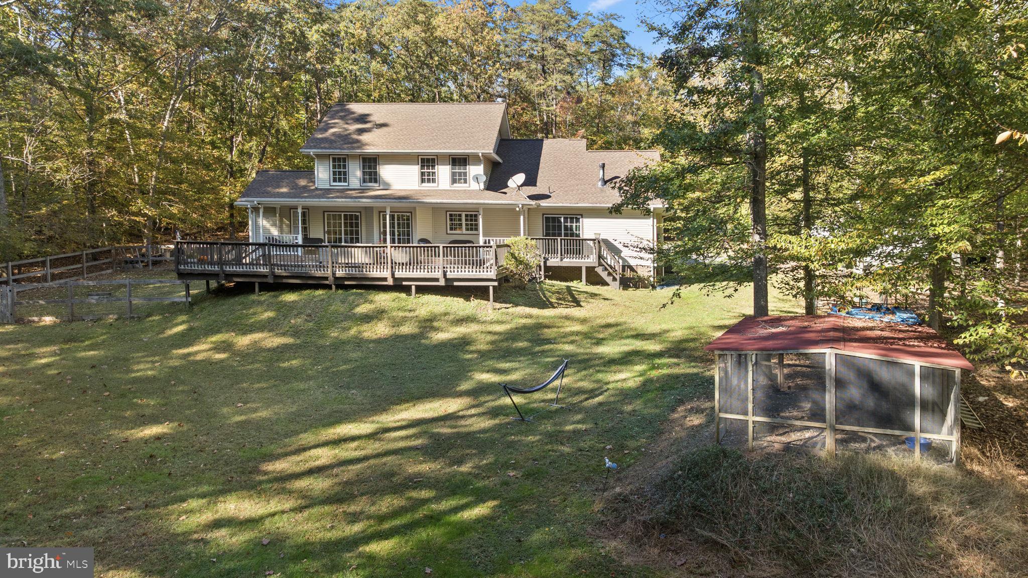 135 Old Cropps Mill Road Fredericksburg, VA 22406 - Photo 42 of 47 a view of a house with a yard balcony and sitting area