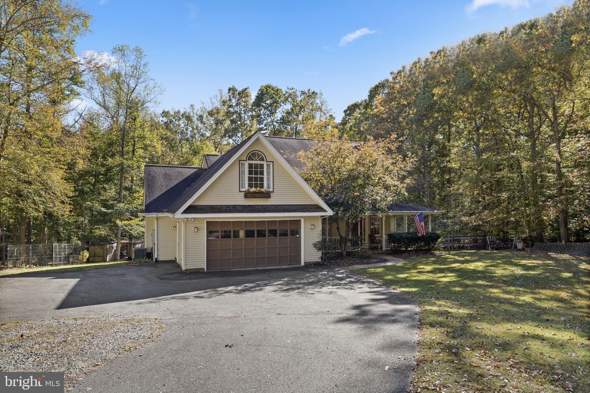 135 Old Cropps Mill Road Fredericksburg, VA 22406 - Photo 6 of 47 a view of a house with a yard