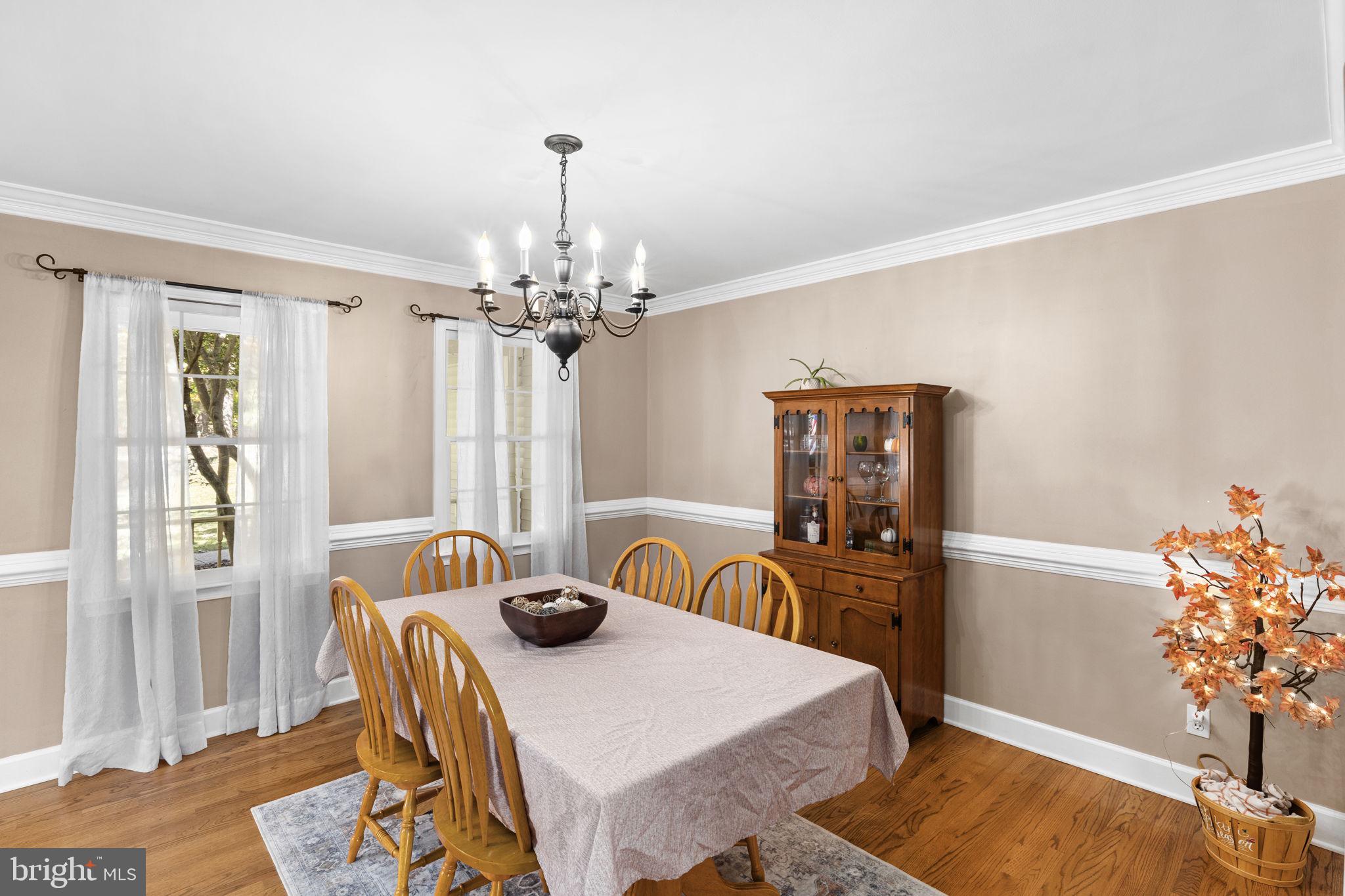 135 Old Cropps Mill Road Fredericksburg, VA 22406 - Photo 9 of 47 a very nice looking dining room with a table and chairs