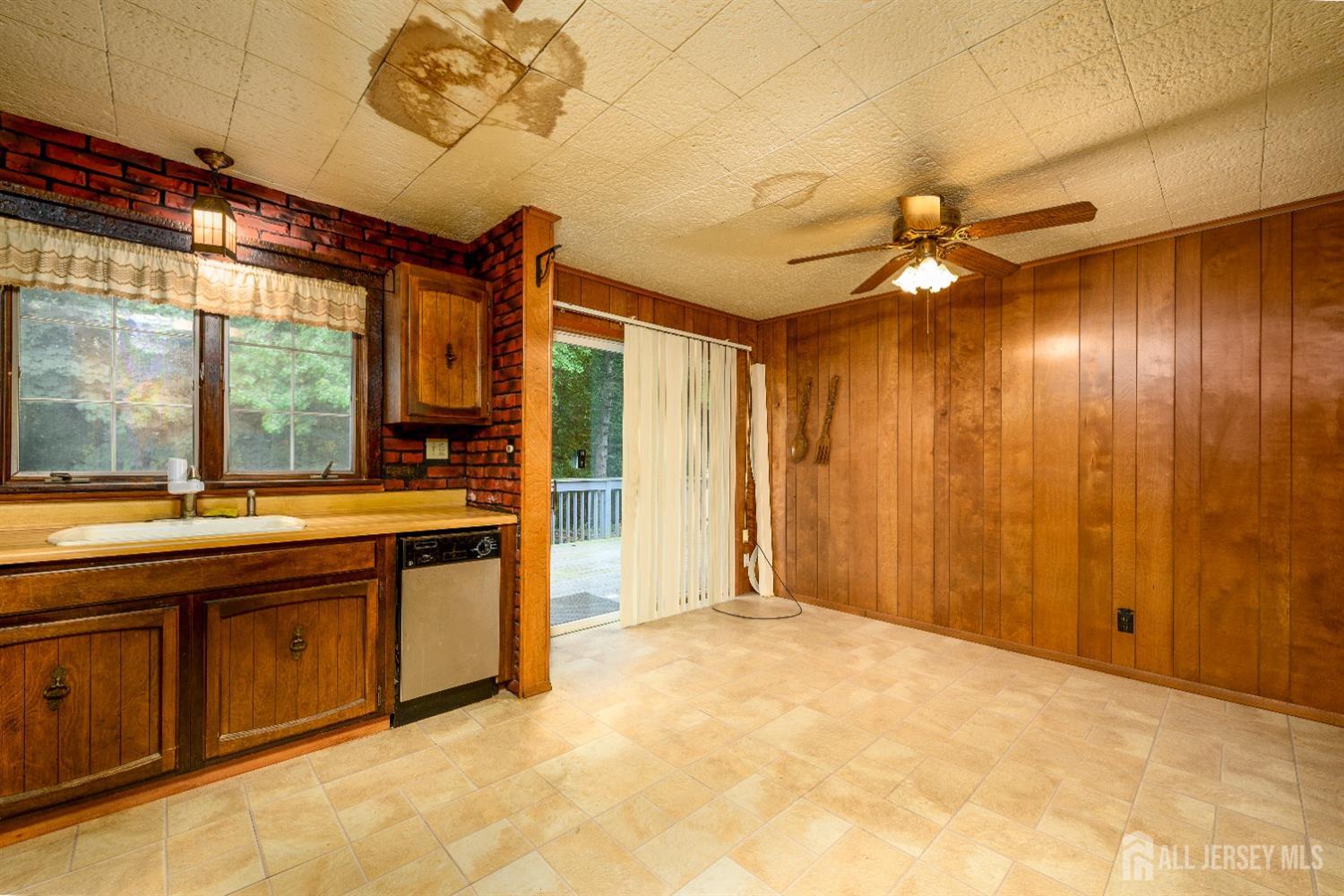 13 Brookside Road Edison, NJ 08817 - Photo 11 of 32 a view of a bathroom with a tub and sink