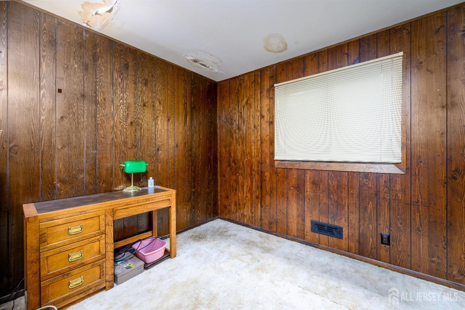 13 Brookside Road Edison, NJ 08817 - Photo 14 of 32 a room with a dresser and a window