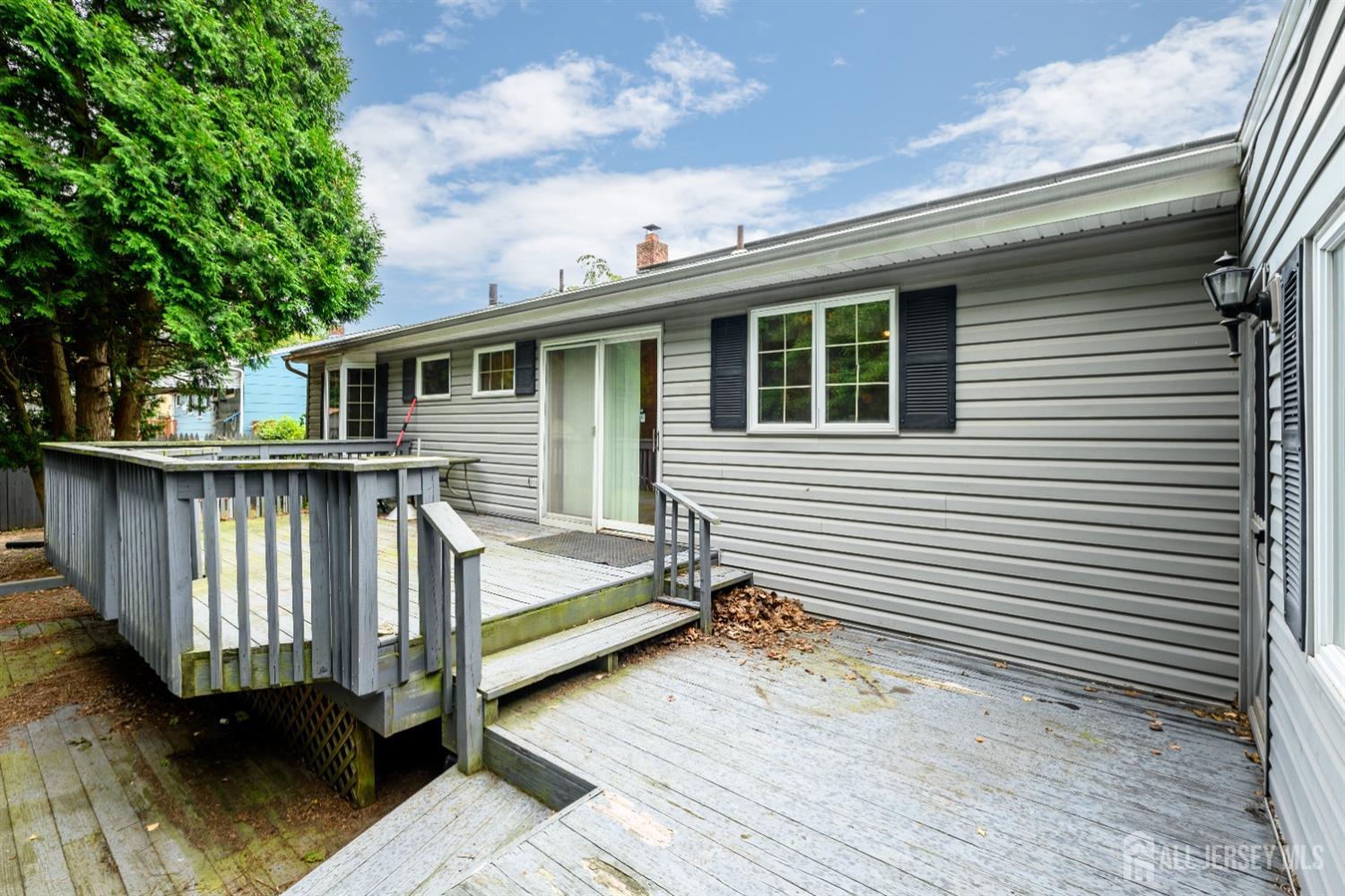 13 Brookside Road Edison, NJ 08817 - Photo 32 of 32 a view of a house with a balcony