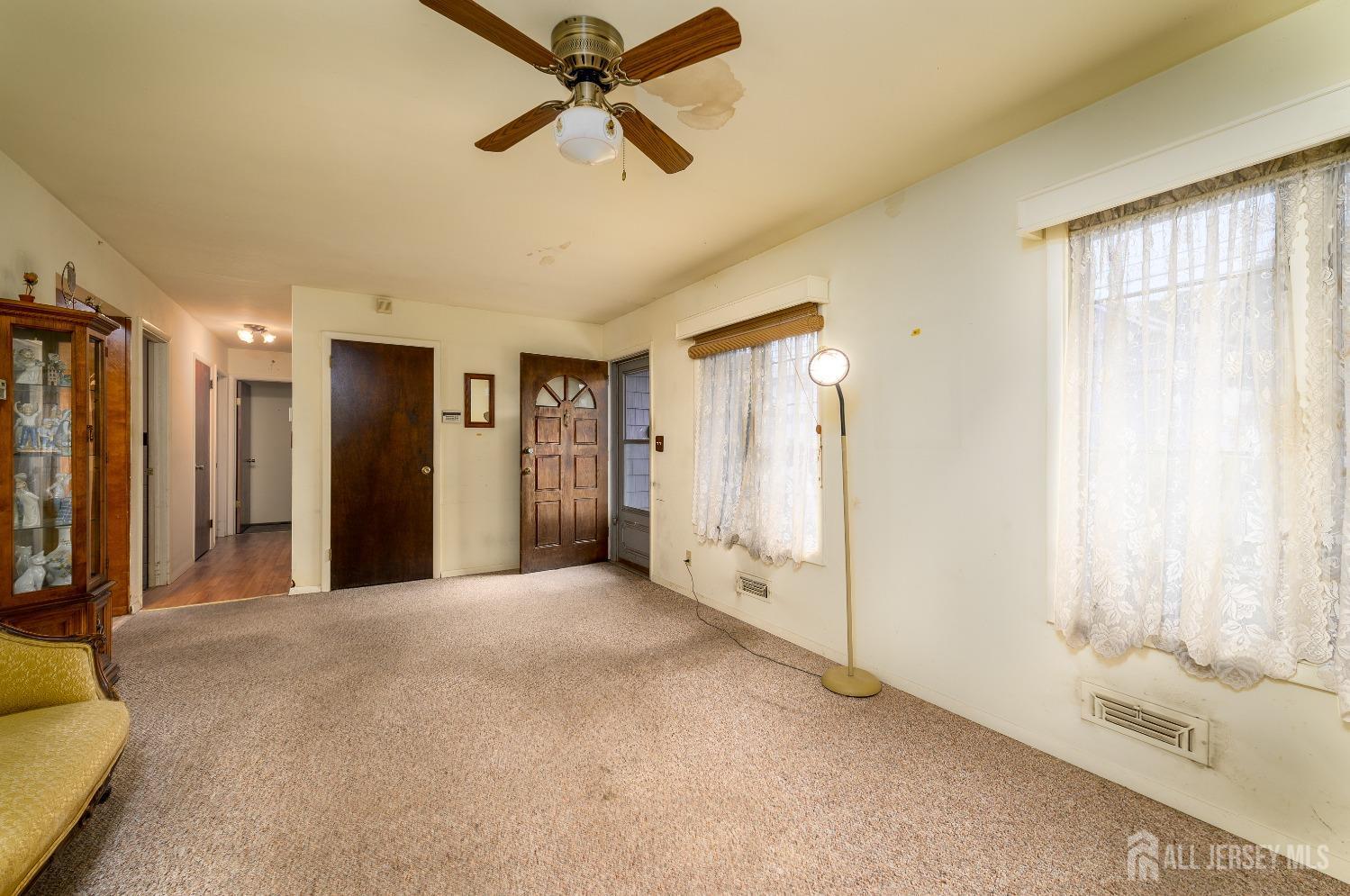 13 Brookside Road Edison, NJ 08817 - Photo 7 of 32 a view of a hallway with a bathroom
