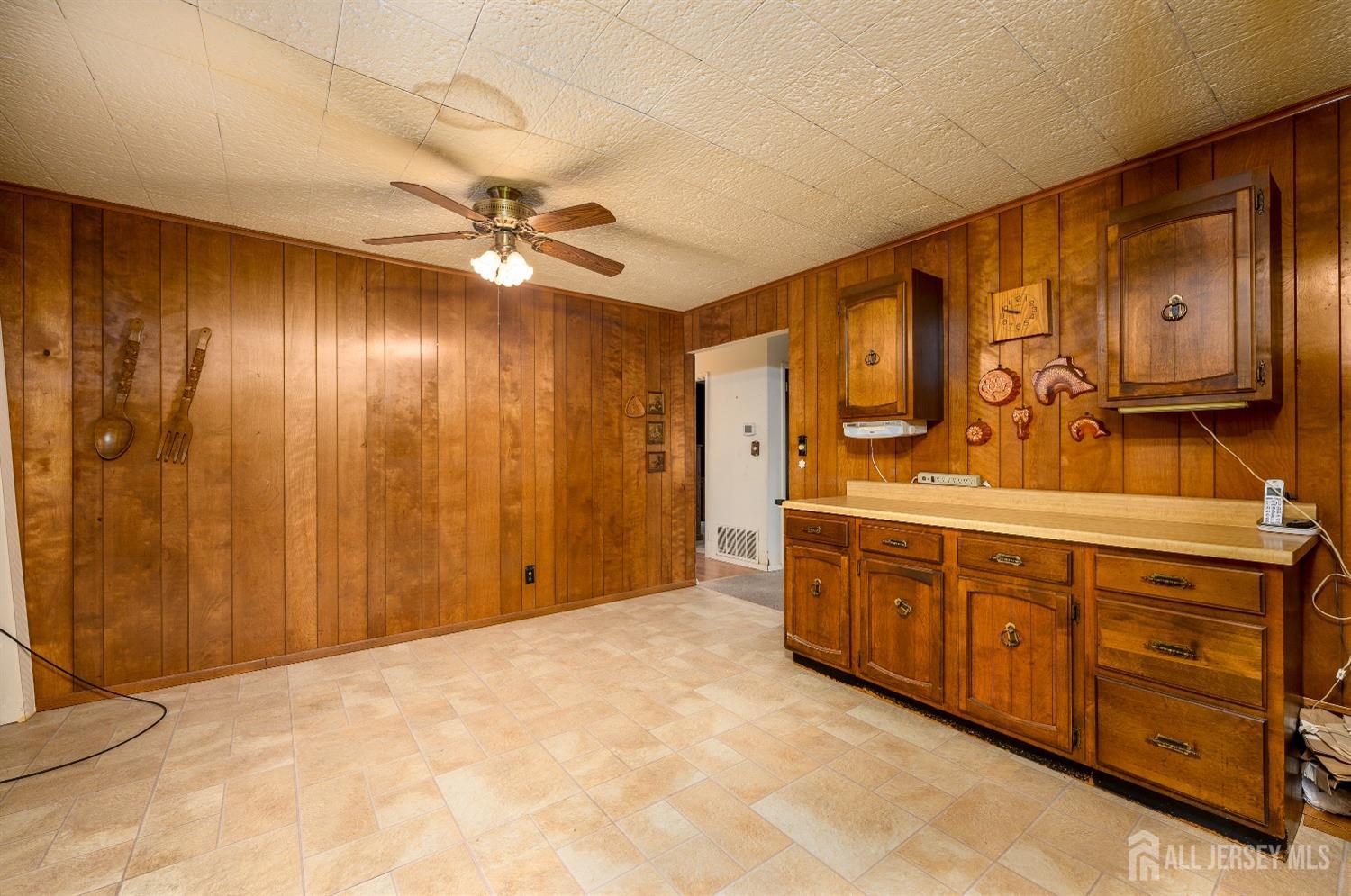 13 Brookside Road Edison, NJ 08817 - Photo 10 of 32 a bathroom with a sink and a mirror