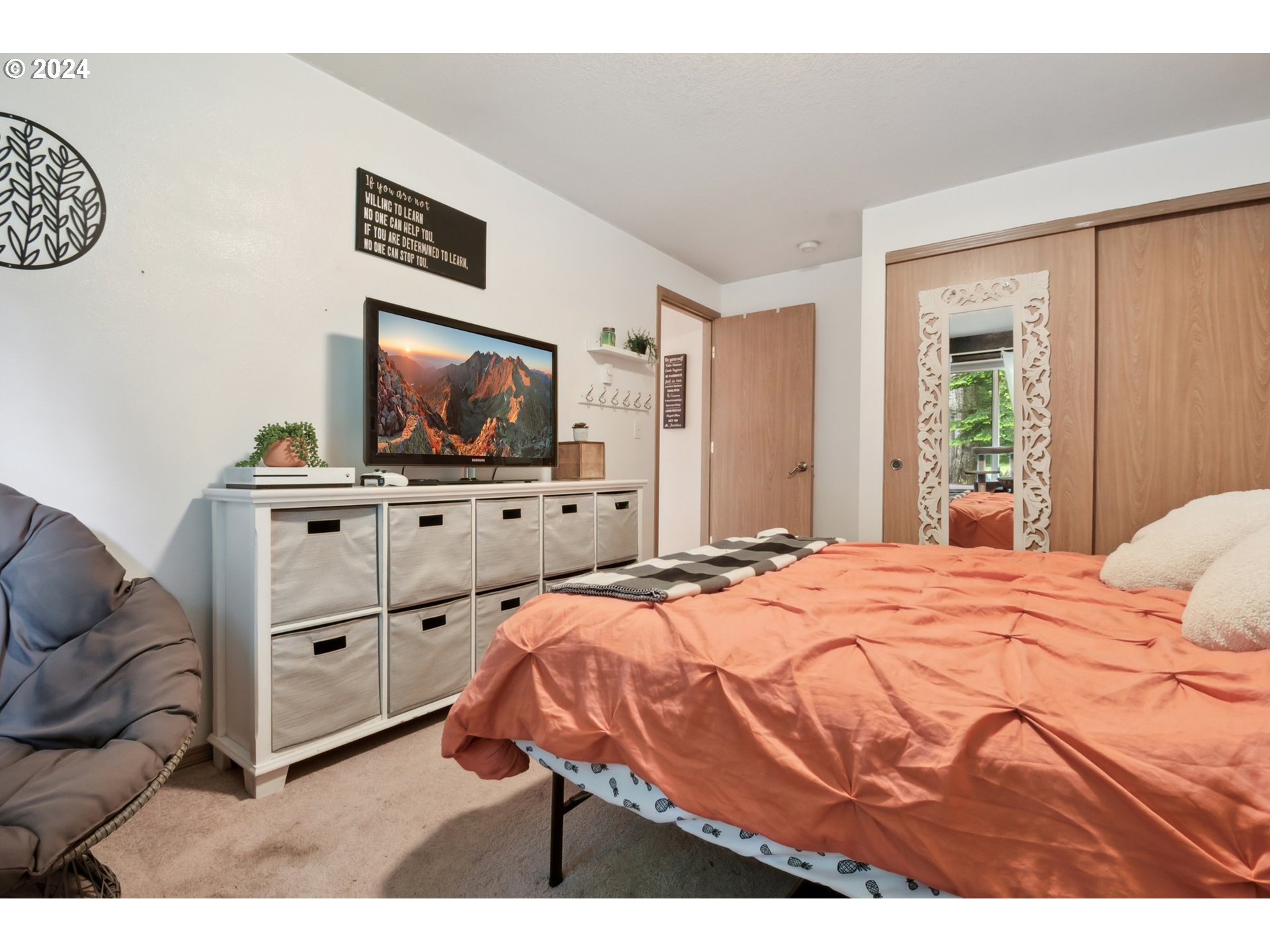 890 1st Falls View Road Stevenson, WA 98648 - Photo 23 of 43 a bedroom with a bed and a flat screen tv