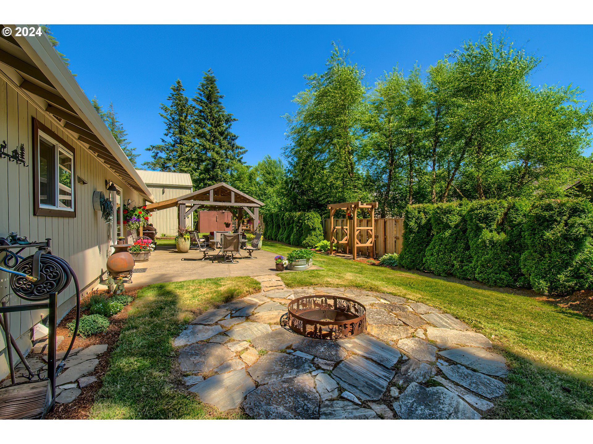 890 1st Falls View Road Stevenson, WA 98648 - Photo 31 of 43 a view of yard with swimming pool and furniture