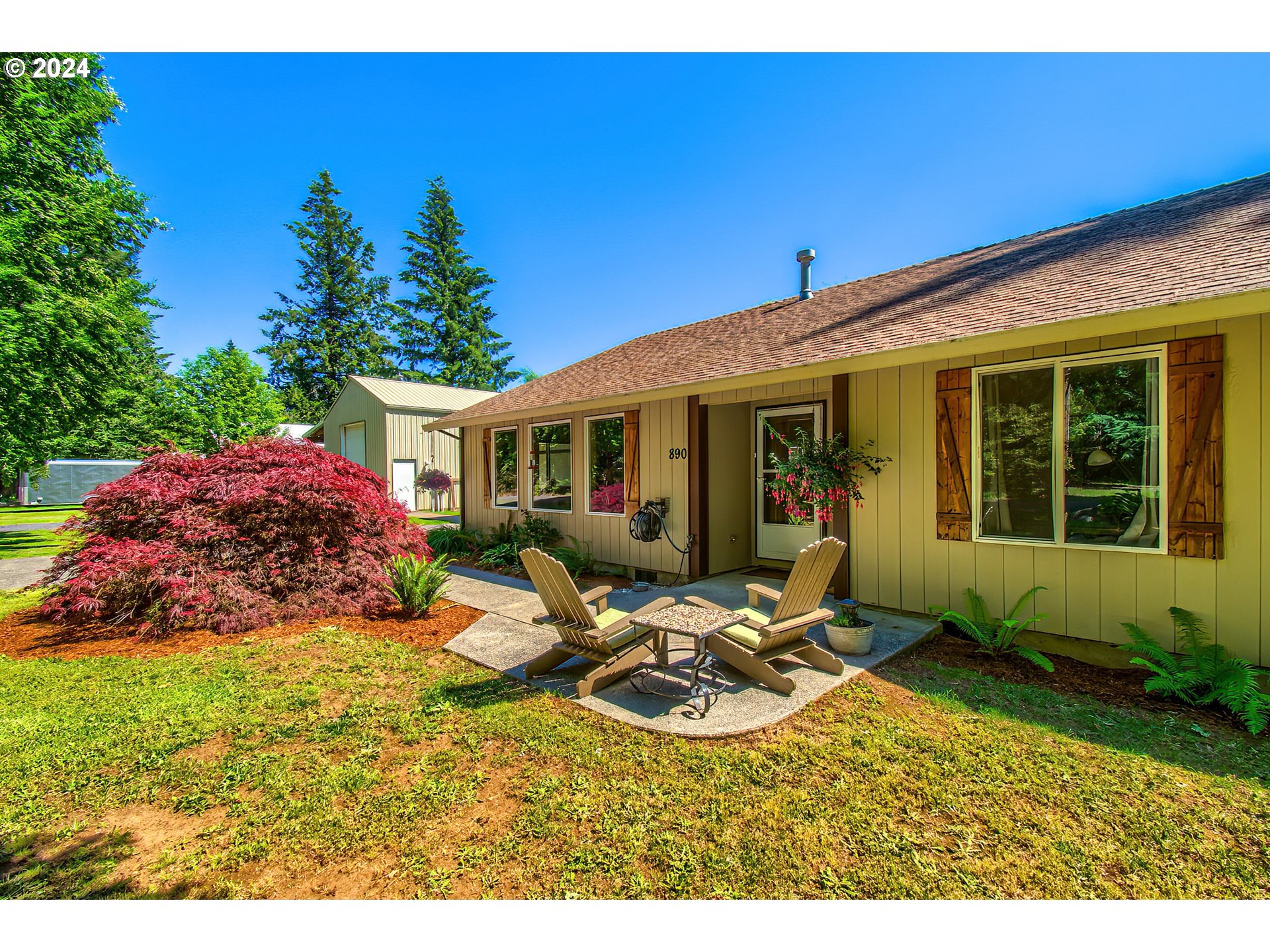 890 1st Falls View Road Stevenson, WA 98648 - Photo 5 of 43 a view of house with backyard outdoor seating and green space