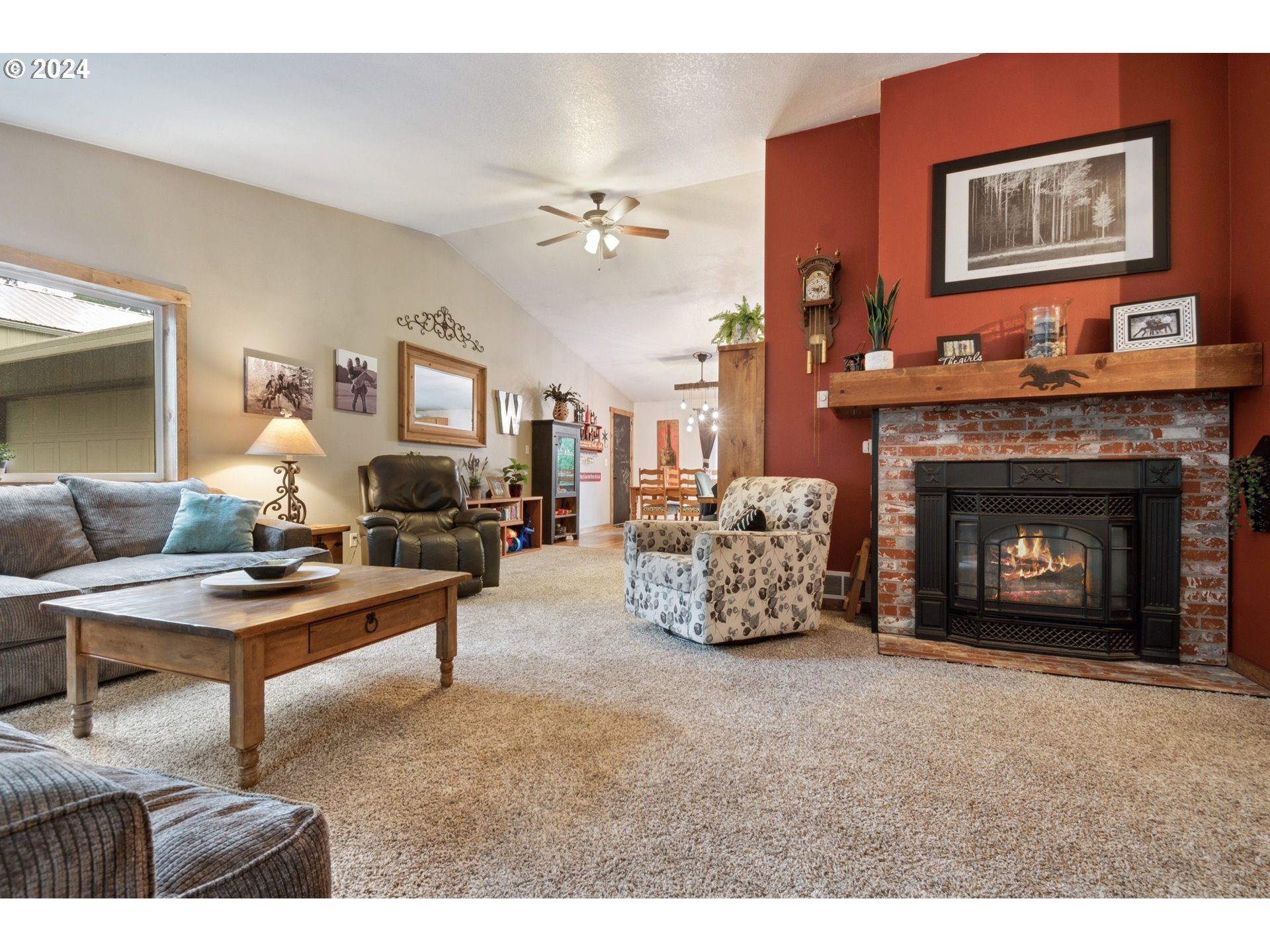 890 1st Falls View Road Stevenson, WA 98648 - Photo 8 of 43 a living room with furniture and a fireplace