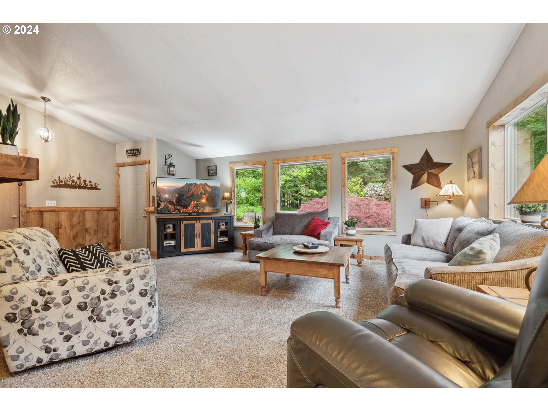 890 1st Falls View Road Stevenson, WA 98648 - Photo 10 of 43 a living room with furniture and a large window