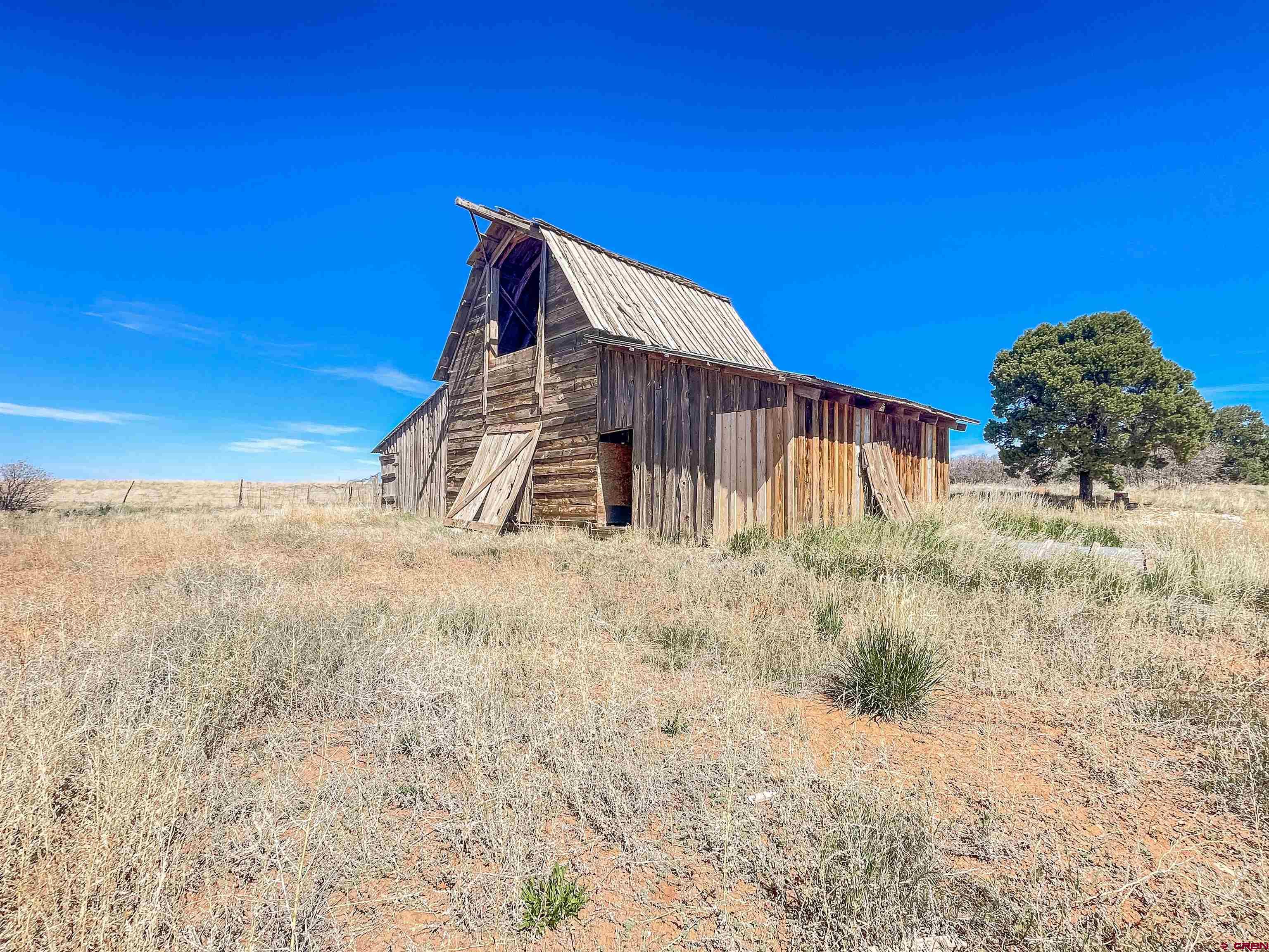 175 County Road Egnar, CO 81325 - Photo 20 of 30 a view of a dry yard with wooden fence
