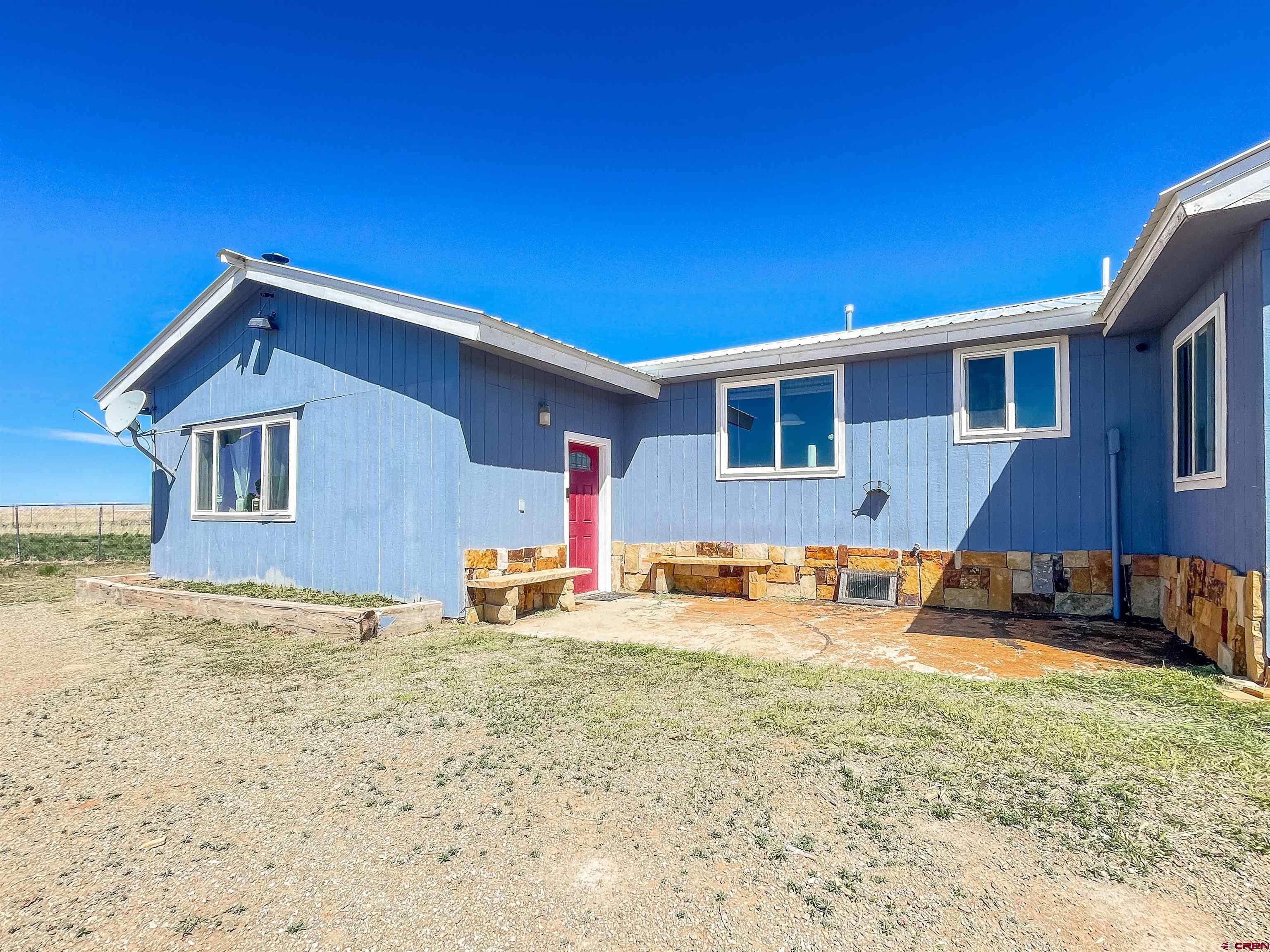175 County Road Egnar, CO 81325 - Photo 27 of 30 a front view of a house with patio