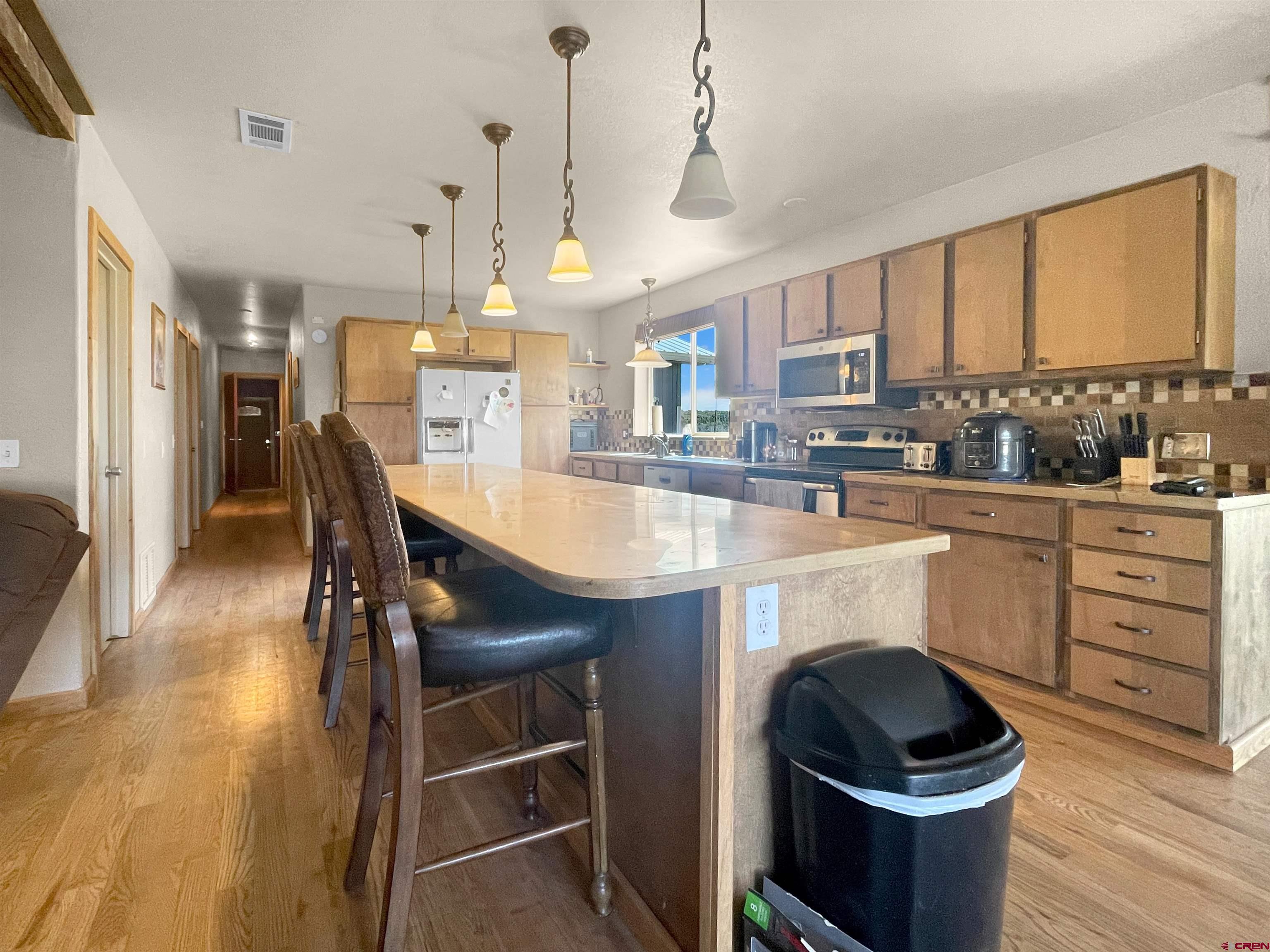 175 County Road Egnar, CO 81325 - Photo 8 of 30 a kitchen with a sink appliances and cabinets