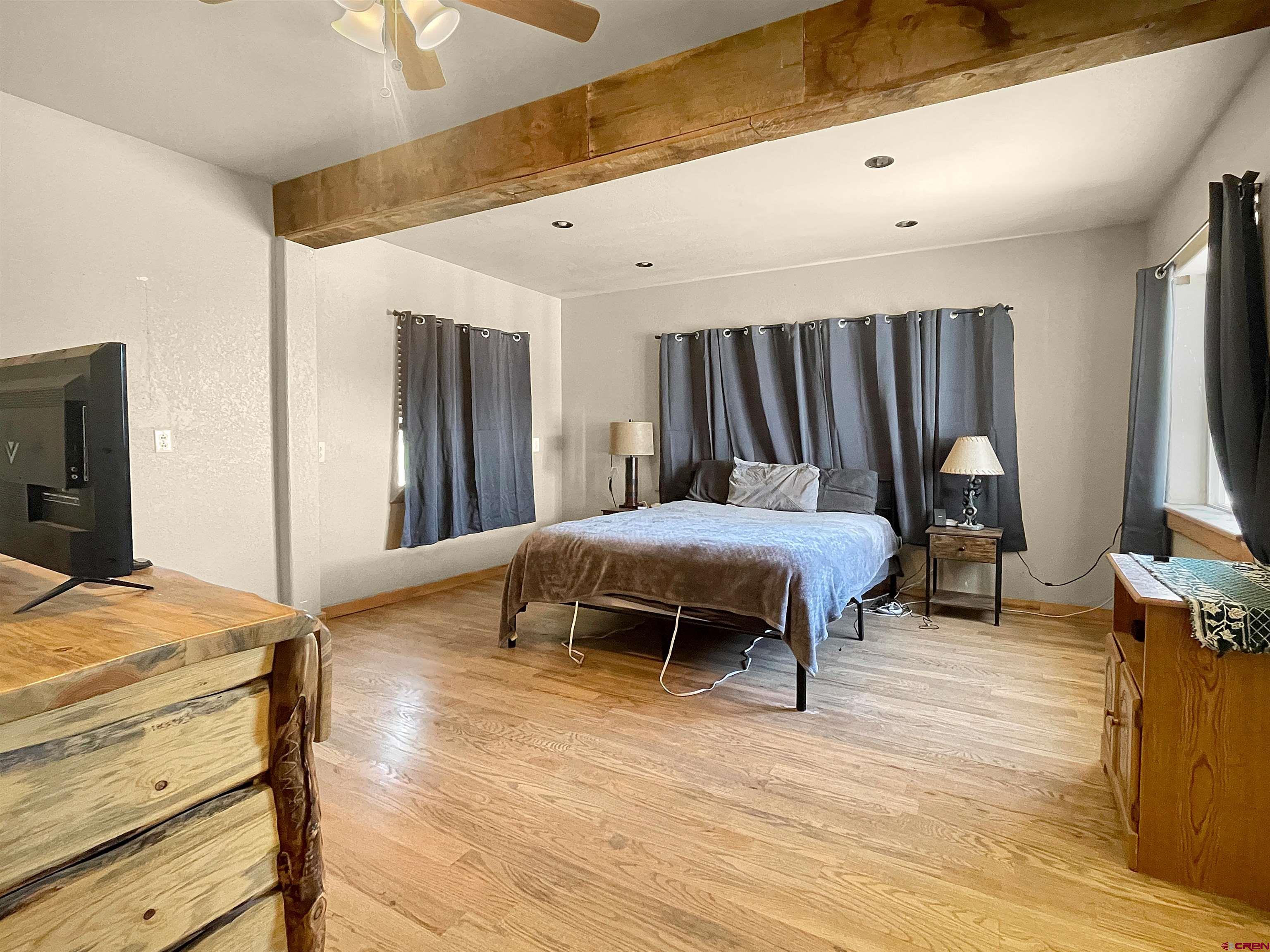 175 County Road Egnar, CO 81325 - Photo 10 of 30 a bedroom with furniture and a flat screen tv