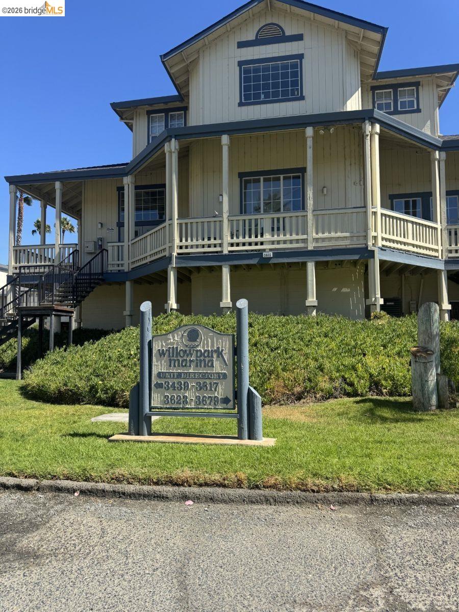 3623 Wells Road Oakley, CA 94561 - Photo 39 of 59 Multi-level residential building featuring a covered porch, exterior stairs, and multiple windows