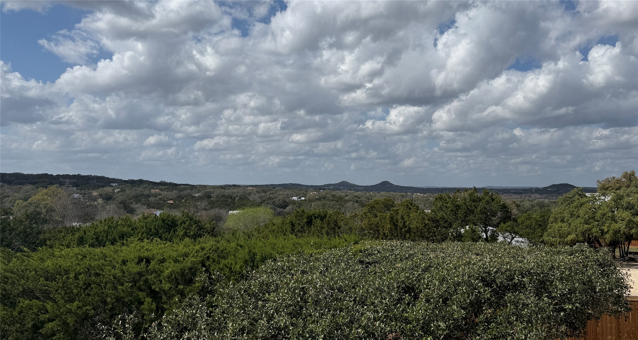 261 Barber Drive Wimberley, TX 78676 - Photo 26 of 37 View of mountain background with a forest