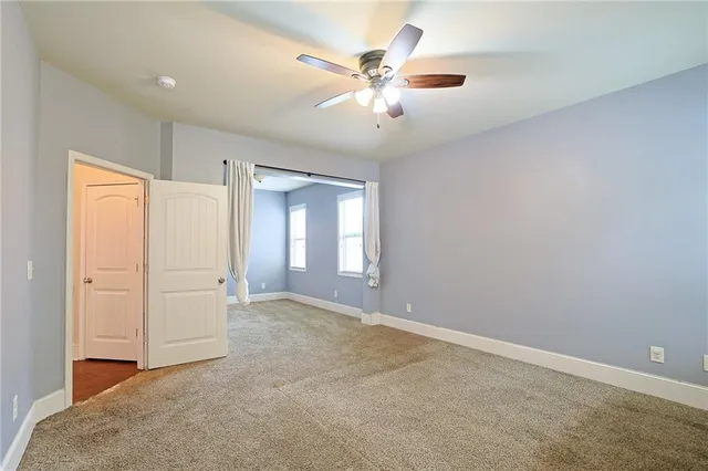 a view of a hallway with seating area