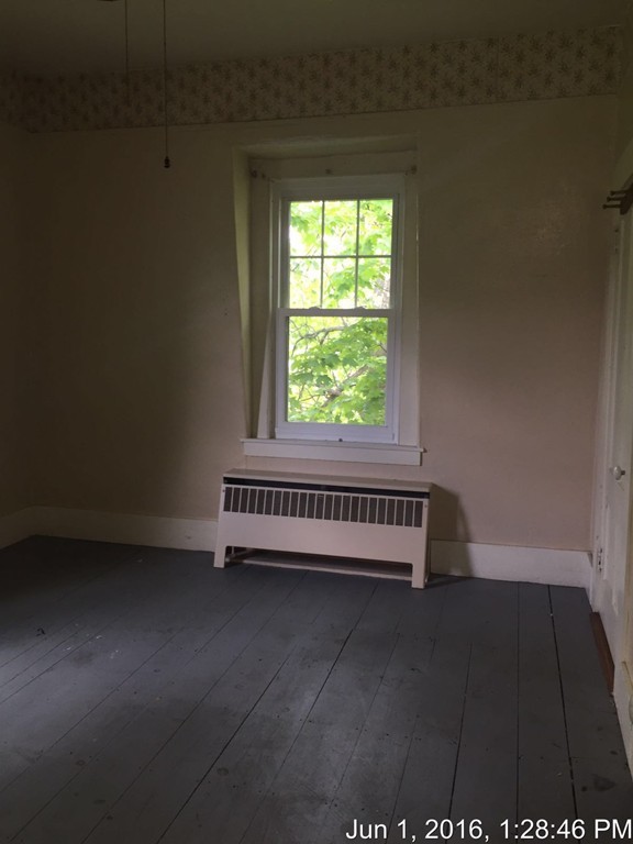 559 Turnpike Road New Ipswich, NH 03071 - Photo 11 of 22 an empty room with a window