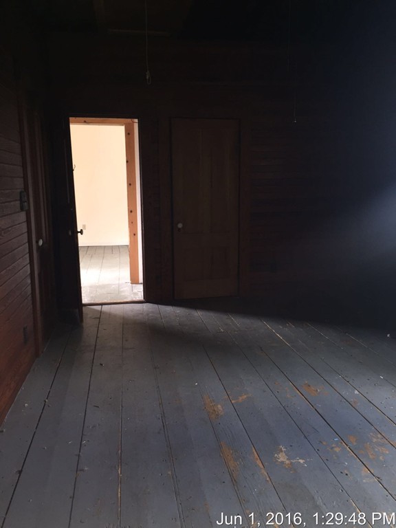 559 Turnpike Road New Ipswich, NH 03071 - Photo 14 of 22 a view of empty room with wooden floor