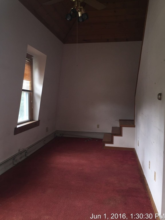 559 Turnpike Road New Ipswich, NH 03071 - Photo 17 of 22 a view of empty room with windows
