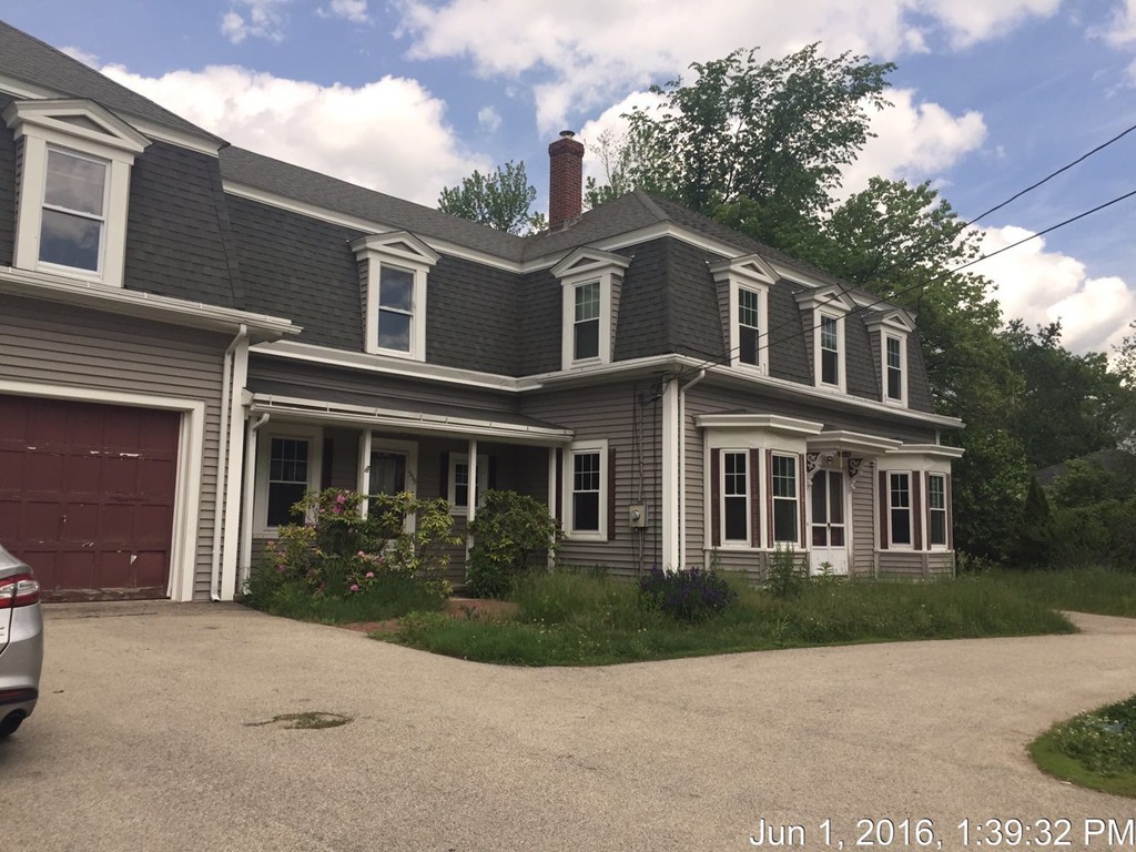559 Turnpike Road New Ipswich, NH 03071 - Photo 2 of 22 a front view of a house with garden