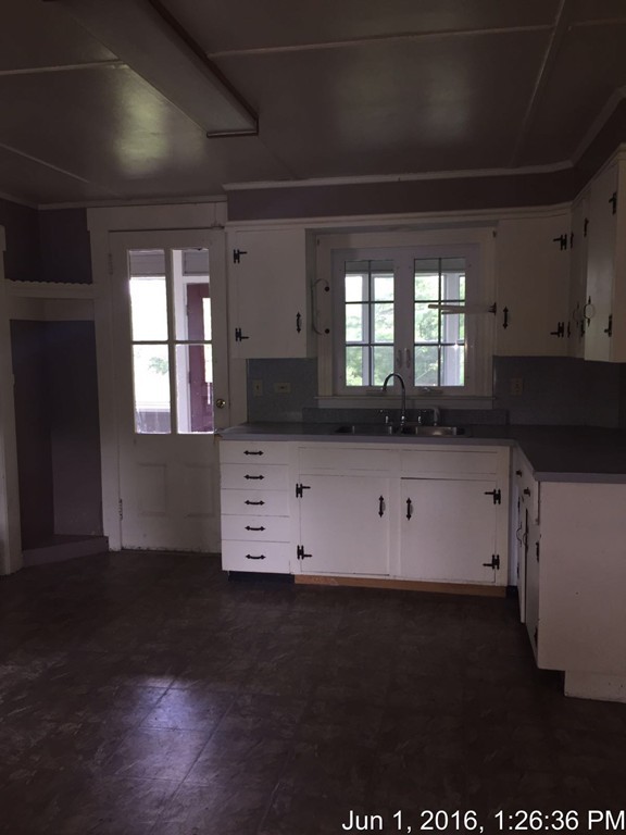 559 Turnpike Road New Ipswich, NH 03071 - Photo 6 of 22 a view of kitchen with granite countertop sink and cabinets