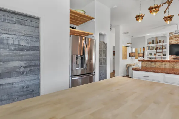 a bedroom with a bed and a cabinets