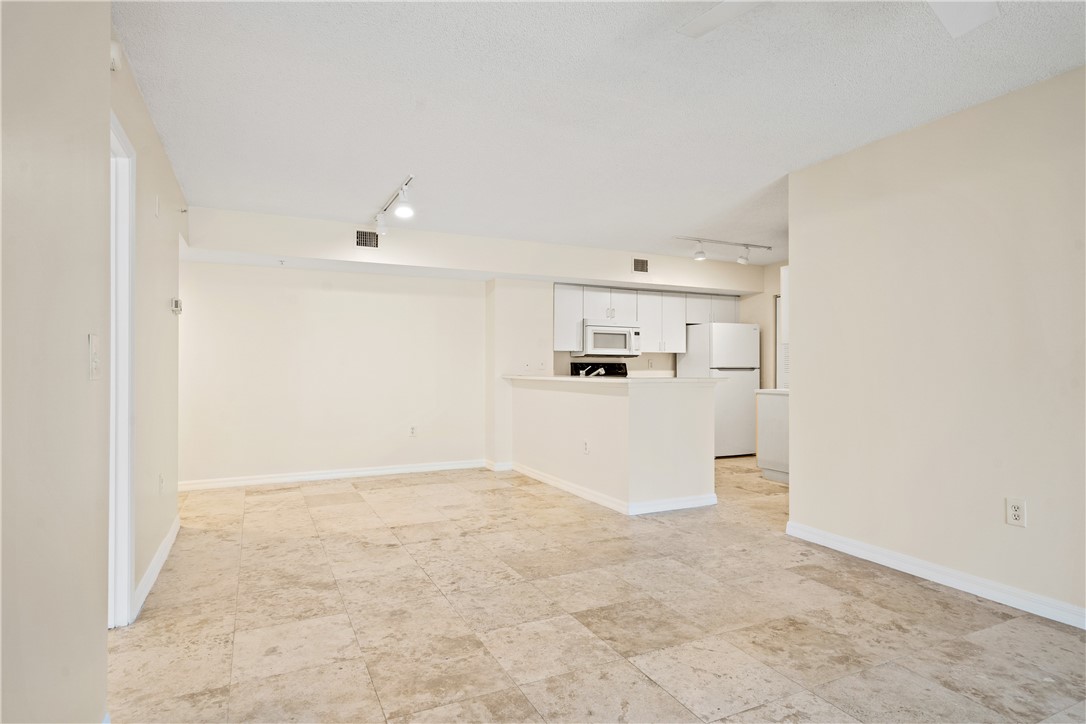 Undisclosed Address Vero Beach, FL 32967 - Photo 12 of 36 a view of kitchen and empty room