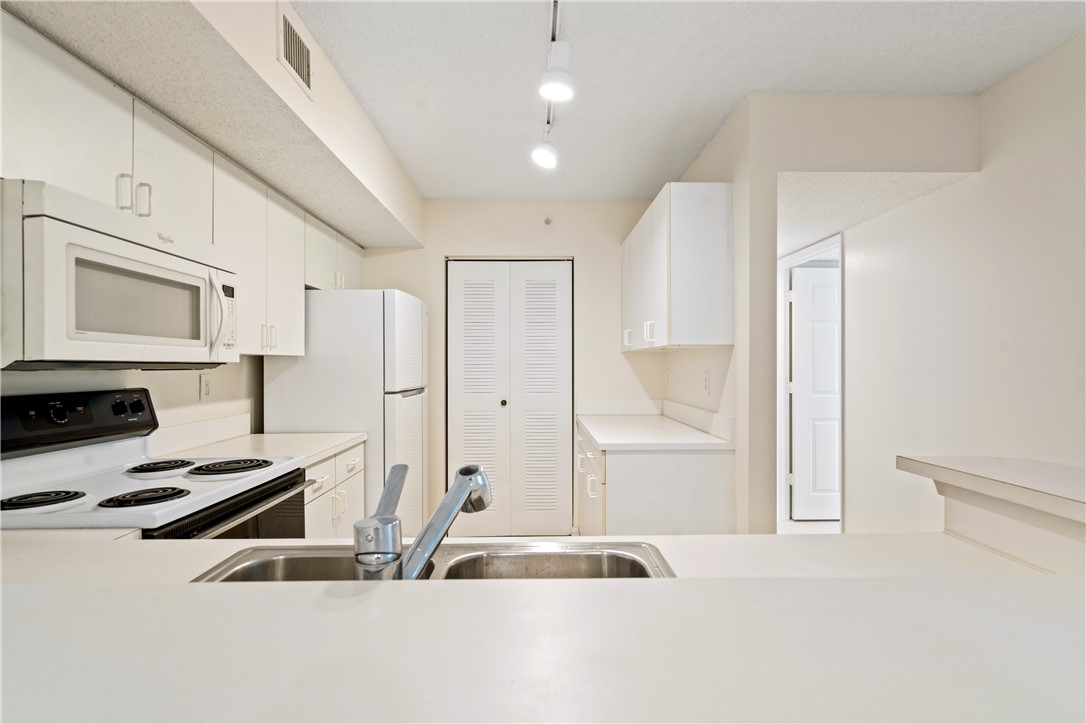 Undisclosed Address Vero Beach, FL 32967 - Photo 18 of 36 a room with gym equipment and a window