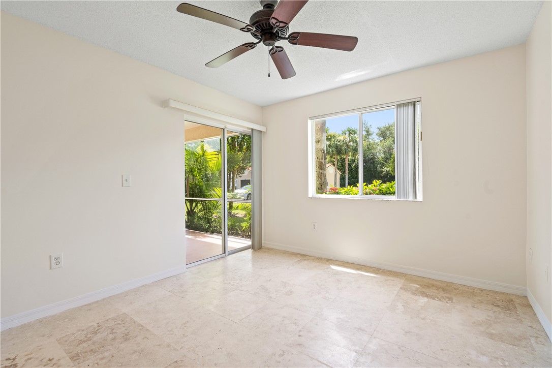 Undisclosed Address Vero Beach, FL 32967 - Photo 20 of 36 a view of an empty room with a window