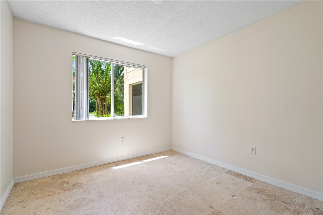 Undisclosed Address Vero Beach, FL 32967 - Photo 22 of 36 an empty room with a window