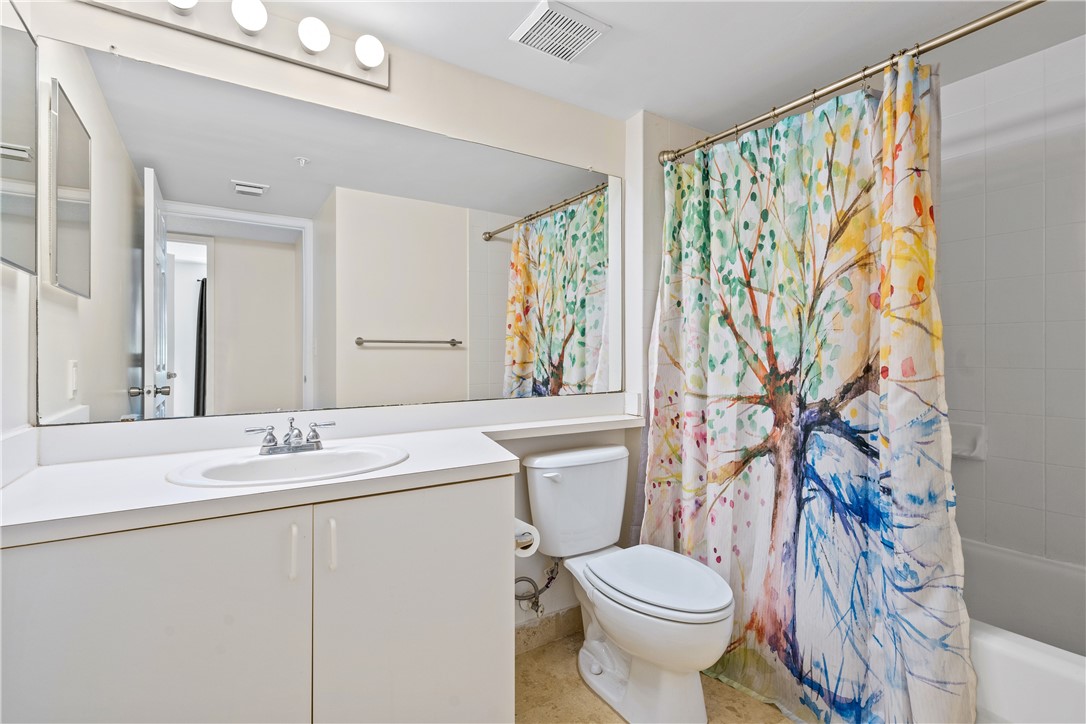 Undisclosed Address Vero Beach, FL 32967 - Photo 25 of 36 a bathroom with a sink toilet and shower